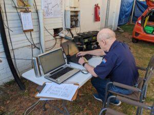 Dave Reece operating the radio