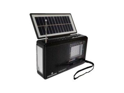 Old fashioned looking portable radio receiver with antenna extended, and a solar panel on top