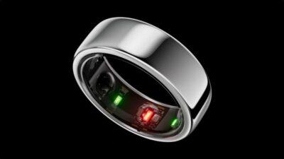 Silver ring with green and red LEDs on its inner rim.