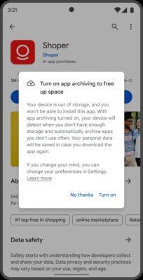 App store screen showing a pop up message offering to enable auto-archiving of apps