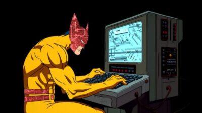 Wolverine hero character sitting and typing on a terminal keyboard