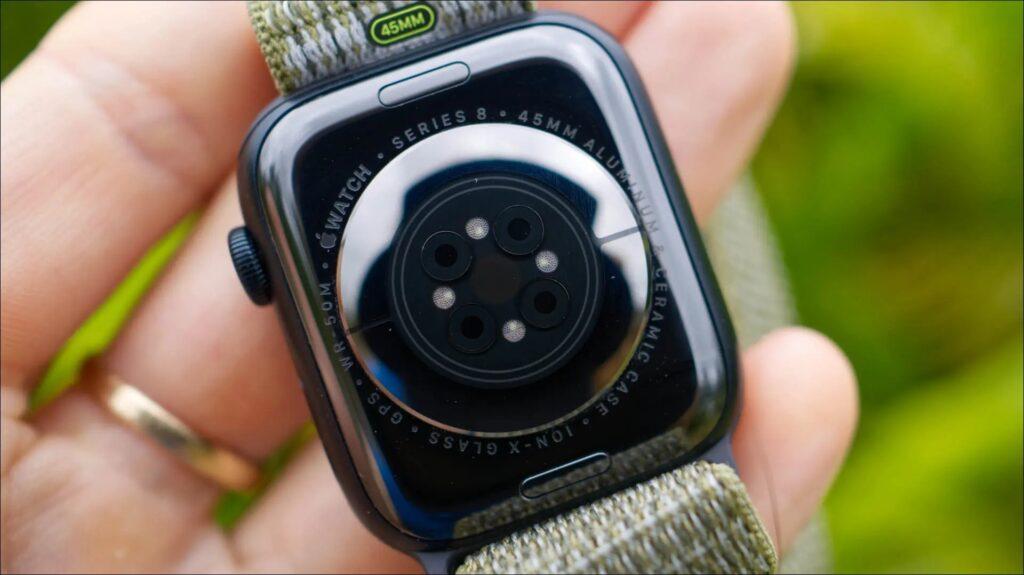 Under side of an Apple Watch showing the sensors
