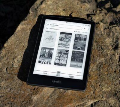 Kindle ereader resting on a rock
