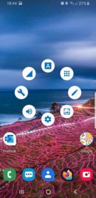 Android home screen showing a circle of icons which are menu icons such as settings, edit, sound, etc.