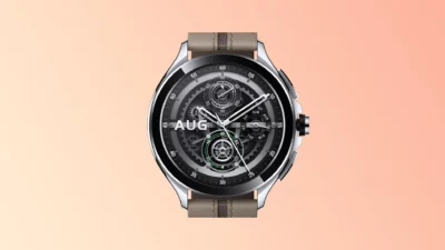 Smartwatch with its strap folded back behind the watch, and a watchface with a chronometer type face with all the inner gears showing.