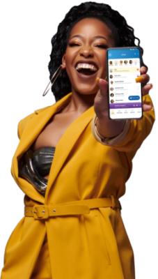 Woman in a yellow dress with arm outstretched holding a phone showing a chat messaging app on the screen.