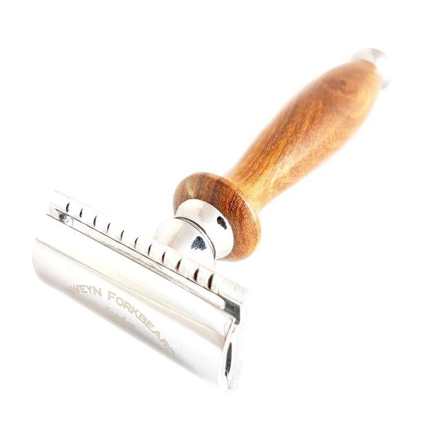 A safety razor with a beautiful solid wood handle