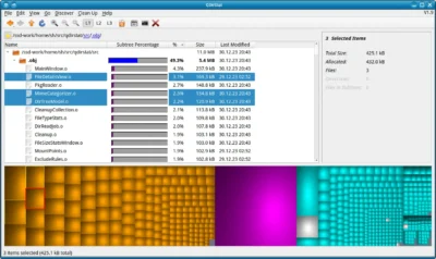 A file explorer type window showing a tree list of folder, with some stats on the right side, and below it is a colour block display depicting the size and type of files using space.