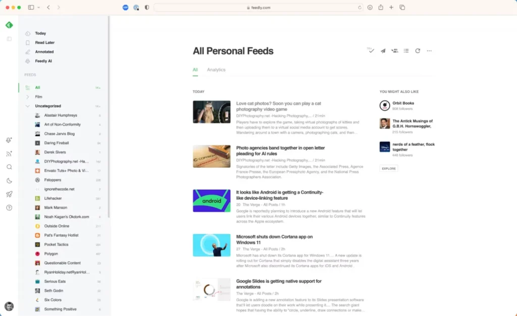 A webpage showing various category names down the left-hand side. In the centre there is a list of5 articles with the heading All Personal Feeds. Each article has a bold text title with an associated excerpt paragraph from the article. To the left of the title and excerpt is a thumbnail image from each article.