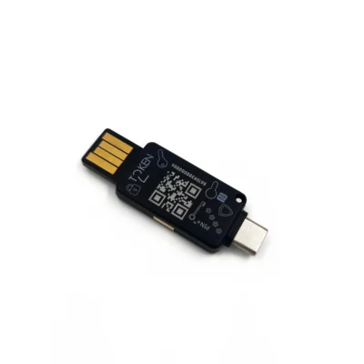 Black plastic device that looks much like a USB stick. At one end there is a USB-A connector and on the other end is a USB-C connector. There is a QR code seen printed on the body.