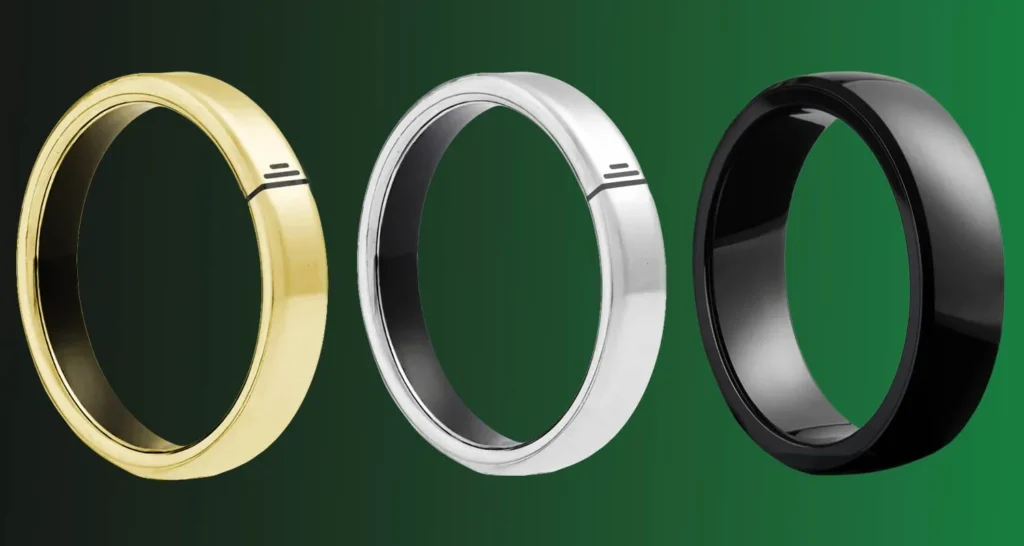 Green background with three finger rings shown. Left one is a gold colour, centre one is silver, and right most ring is a charcoal colour.
