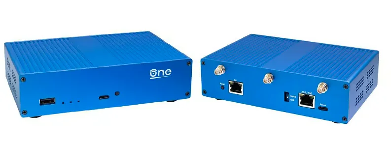 Two blue coloured rectangular shaped routers standing next to each other. Left one has a label on it saying One, and a USB-A and a USB-C port. The other shows three antenna jacks and two Ethernet ports at the front.