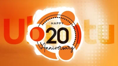 Orange background with Ubuntu logo and words Happy 20 Anniversary Ubuntu