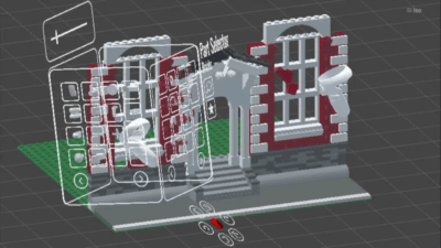 A screenshot of a virtual reality view of a Lego house being built. In the foreground is a hovering cube that shows the words Parts Selector nest to it.