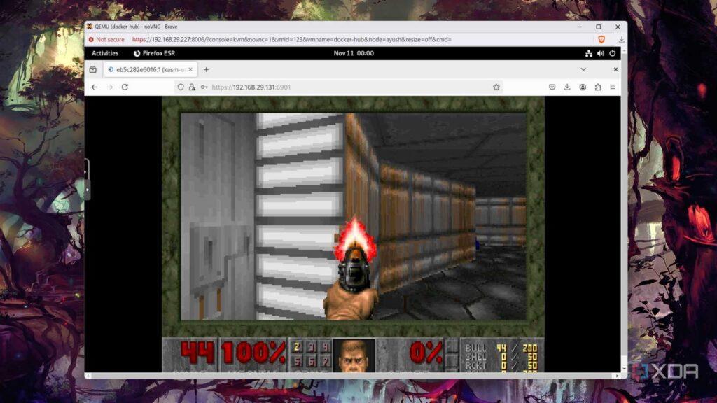 A desktop with a browser open. Shown on the browser screen is the game of Doom with the hand in the foreground holding the pistol.