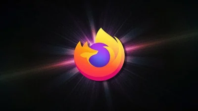 Firefox logo displayed against a dark background, radiating vibrant colors of orange, yellow, and purple, symbolizing speed and energy.