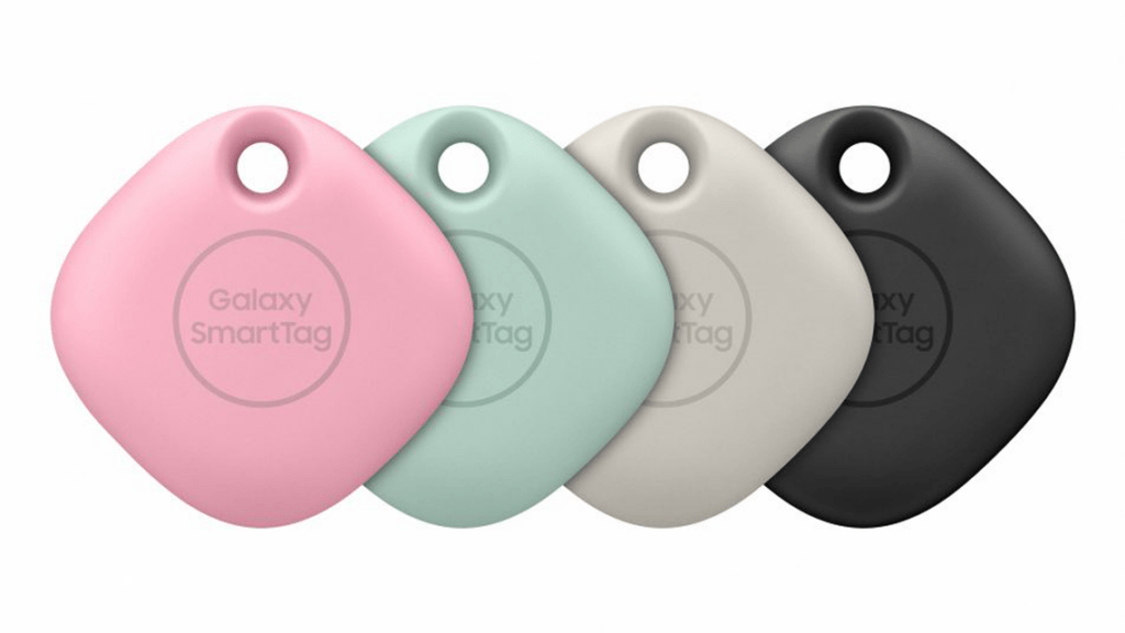 Four Galaxy SmartTags in pink, mint green, beige, and black, showcasing their sleek, rounded design for tracking items.