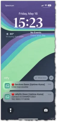 A smartphone screen displays the time, weather, and notifications for service downtime, with a colorful abstract background.