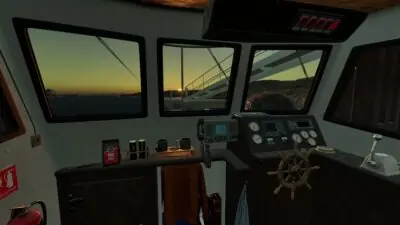 The interior of a boat's control cabin, featuring steering controls, instruments, an ornate wheel, and a sunset view through large windows.