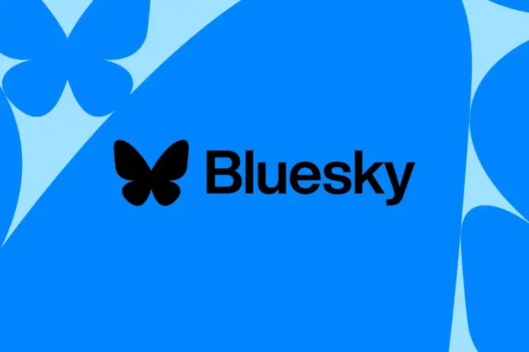 The image features the "Bluesky" logo, a black text with a butterfly symbol, set against a vibrant blue background.