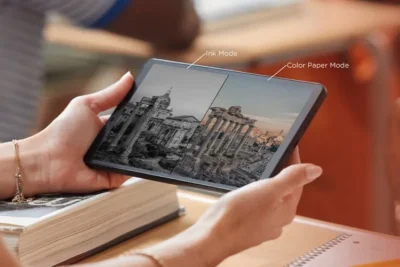 A person holds a tablet displaying a split-screen image of ancient ruins in Ink Mode and Color Paper Mode.