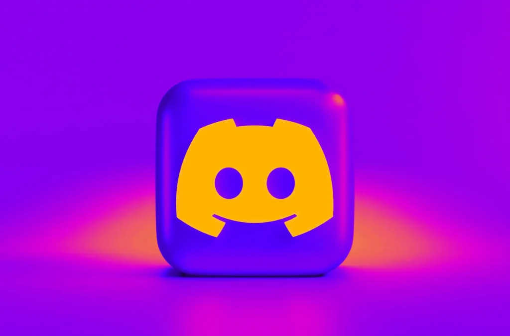 A glowing purple background features the Discord logo, a yellow smiley face with a headset, centered on a glossy cube.