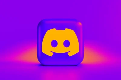 A glowing purple background features the Discord logo, a yellow smiley face with a headset, centered on a glossy cube.