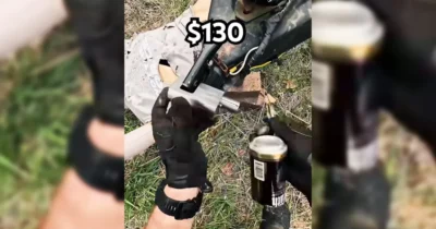 Lock Company Sues Man Who Picked Its Lock, Gets Horribly Humiliated 10 A person in gloves demonstrates using spray paint on a metal object priced at $130, with tools scattered in a grassy area.