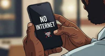 A person holding a smartphone displaying "NO INTERNET" with a Wi-Fi symbol crossed out, indicating a lack of internet connectivity.