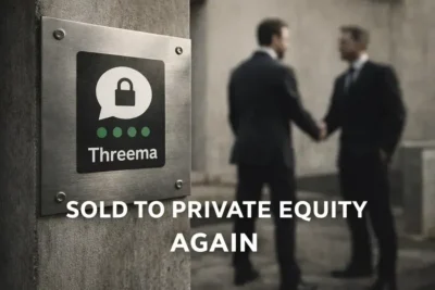 Sign for Threema messaging app with two men in suits shaking hands in the background, emphasizing the sale to private equity.