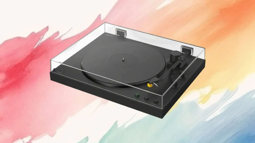 A sleek black turntable with a clear cover, set against a colorful abstract background. Ideal for vinyl enthusiasts.