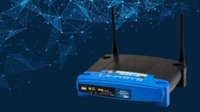 Linksys Wireless-G broadband router with two antennas on a digital blue network background.
