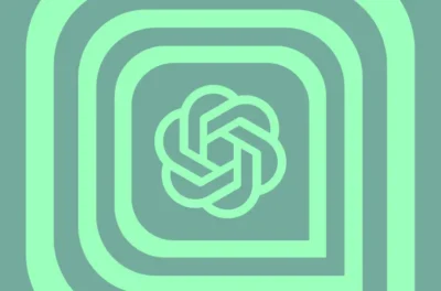 Abstract green geometric design with interlocking shapes forming a floral pattern in the center on a muted green background.