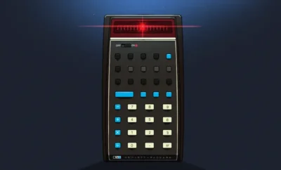 “I’m Not Dead Yet!” Reverse Polish Notation Calculators You Can Still Buy 6 Vintage Hewlett-Packard calculator with red LED display and black, blue, and beige buttons on a dark background.